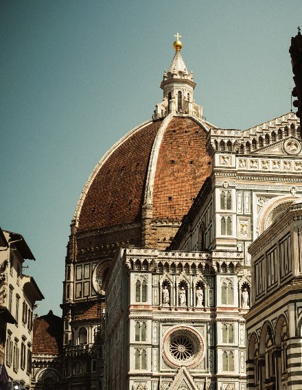 Brunelleschi's dome above the cathedral's tricolour marble facade