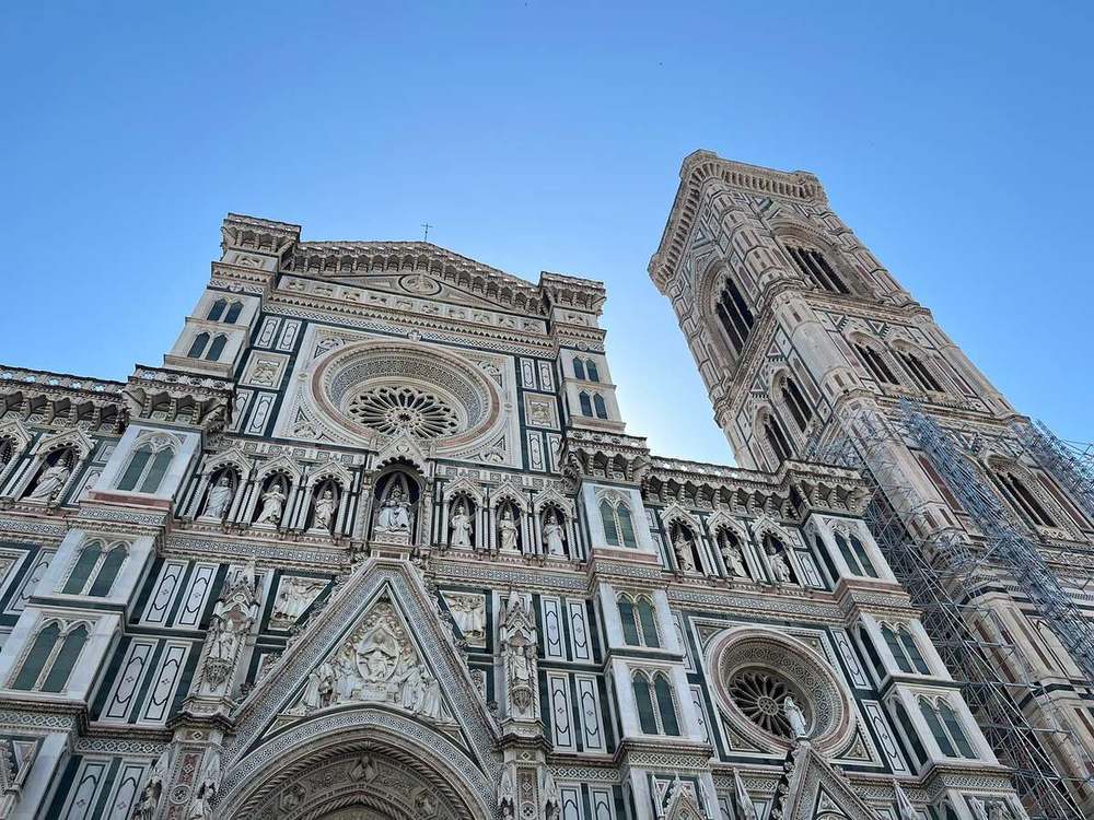 Visitors in Piazza del Duomo below the dome
